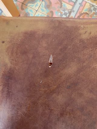 Silla vintage de madera y cuero