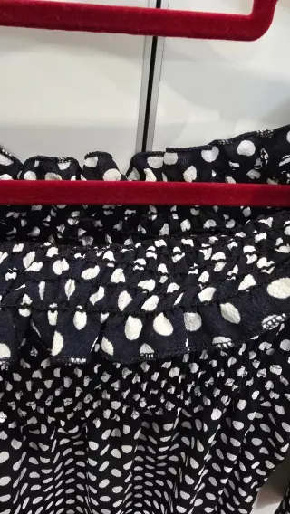 Blusa de lunares cuello barco