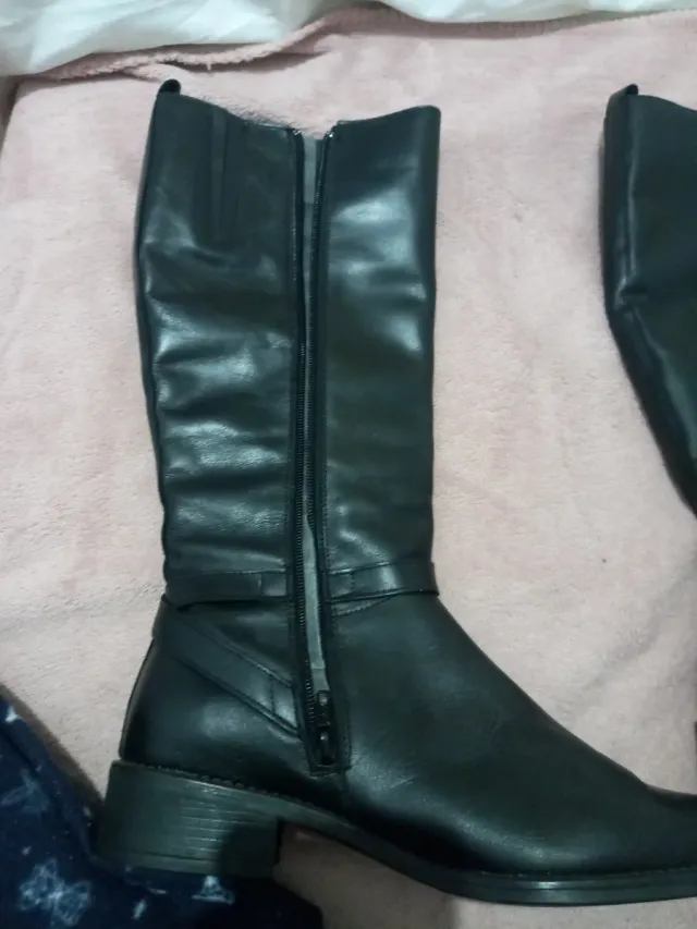 Botas altas negras con hebilla