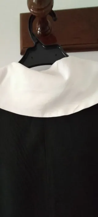 Blusa, marca Tráfico de Modas. Negro con cuello bl