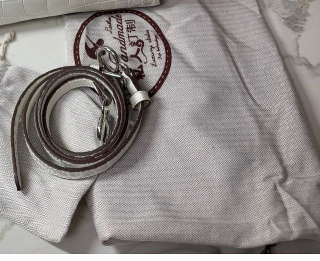 Bolso de mano efecto piel cocodrilo