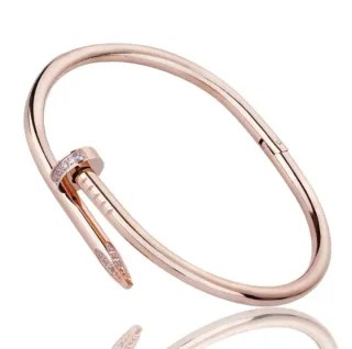 Bracciale rigido chiodo donna acciaio oro rosa