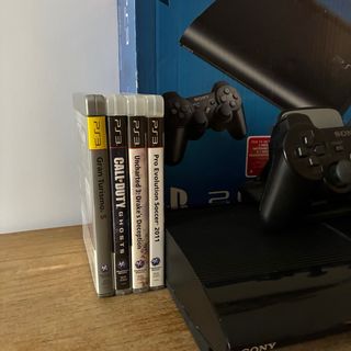 Ps3 Slim con scatola, controller e cavi e giochi