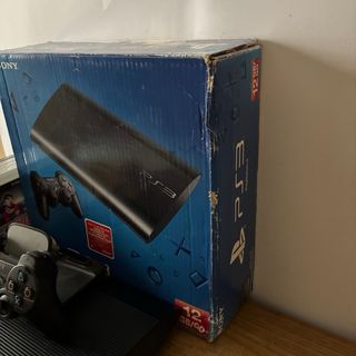 Ps3 Slim con scatola, controller e cavi e giochi