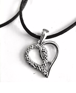 Collana con ciondolo cuore argentato unisex