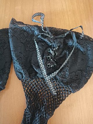 Calze autoreggenti a rete con fiocchetti