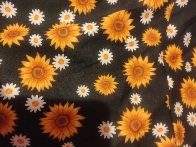 Vestido negro con flores naranjas