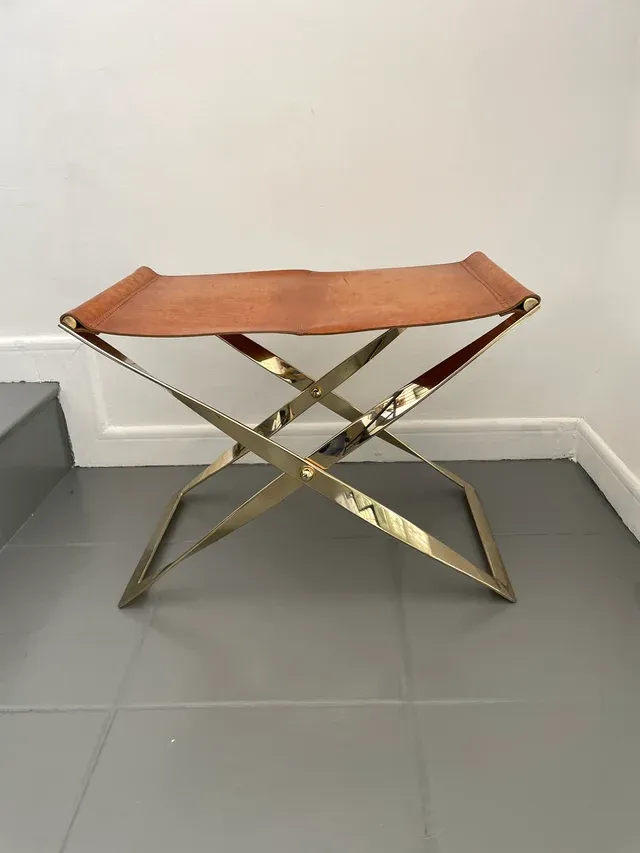 Sgabello pieghevole in pelle e metallo Kaljerone