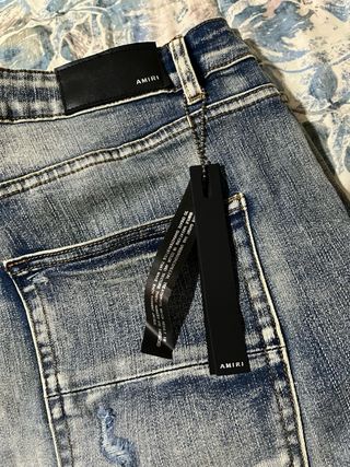 Pantalones Amiri Azules Rotos