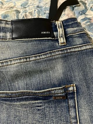 Pantalones Amiri Azules Rotos
