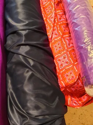 7 rollos de tela satinada