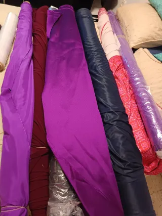 7 rollos de tela satinada