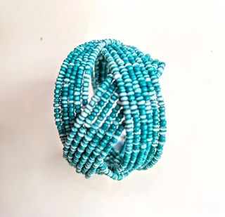 Bracciale rigido azzurro perline fatto a mano