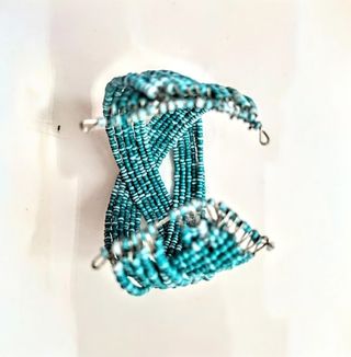 Bracciale rigido azzurro perline fatto a mano