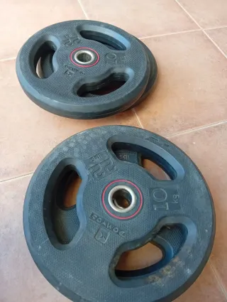 Dos Discos de pesa 10 kg y 25 lbs