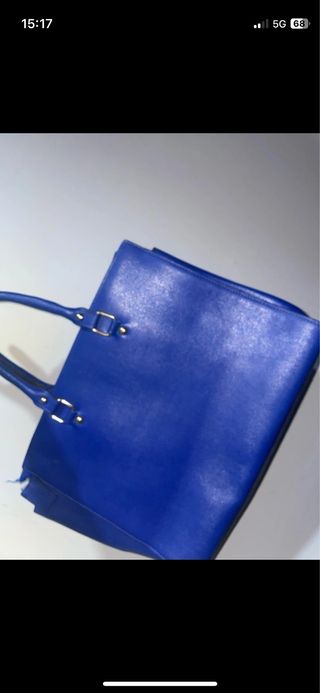Borsa blu con borchie dorate