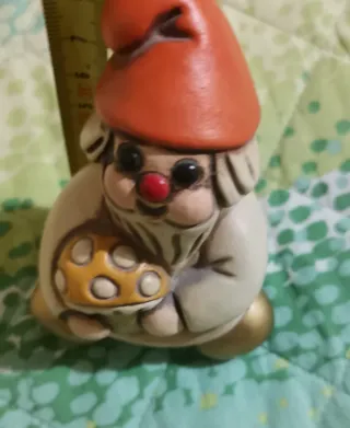 Thun gnomo con fungo dorato