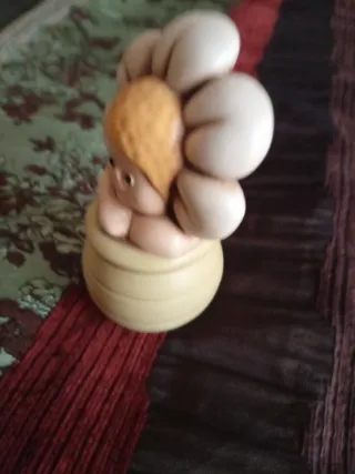 Egan statuetta ceramica Bimbo Fiore in vaso