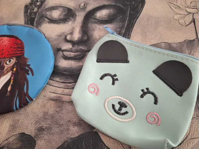 Dos monederos gato pirata Johnny Depp y perro