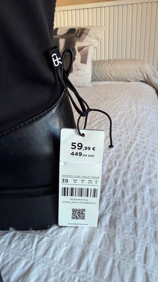 Botas altas planas negras