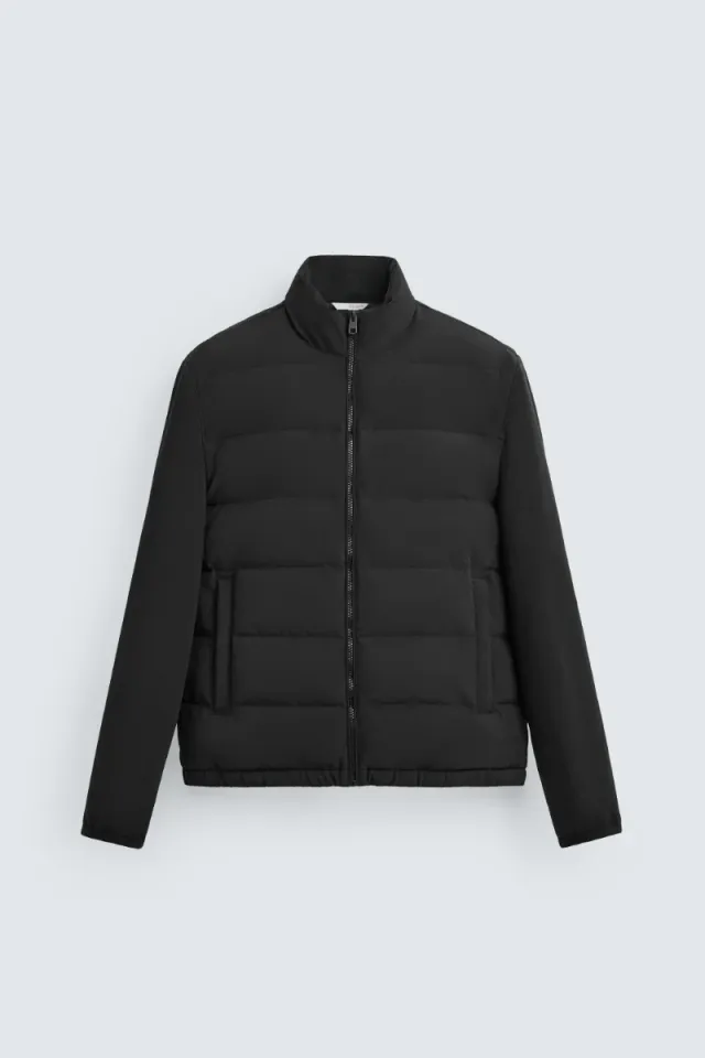 Cazadora acolchada cuello subido negra