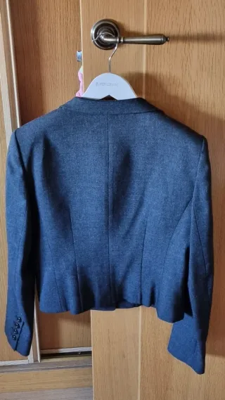 Torera gris elegante