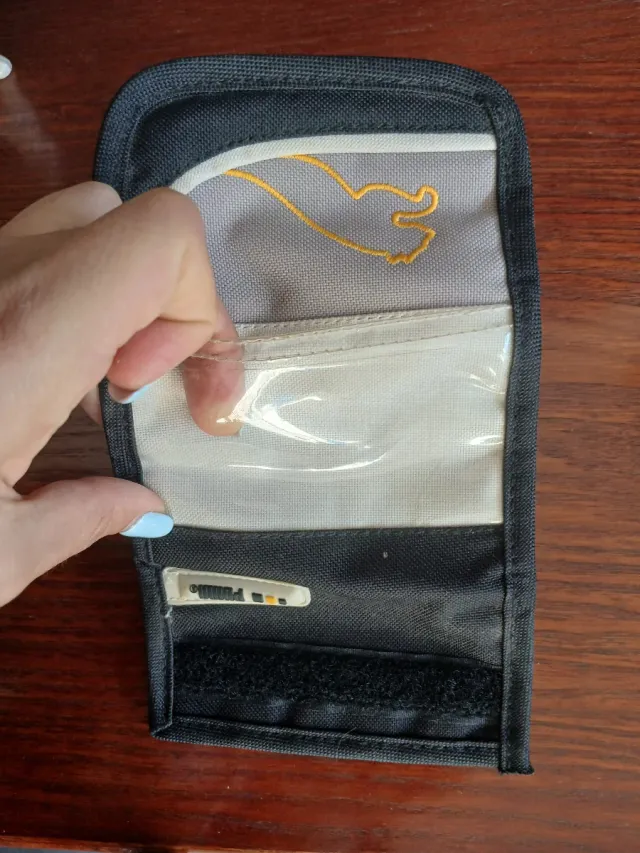 Cartera Puma tela gris y negra