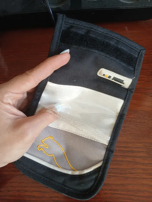 Cartera Puma tela gris y negra