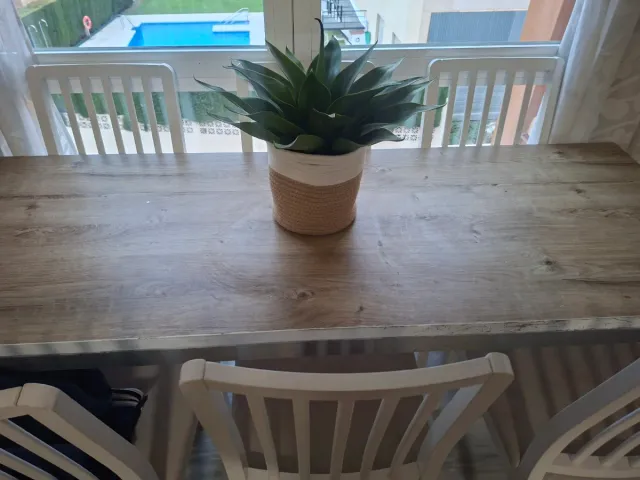 Tavolo da pranzo in legno e acciaio