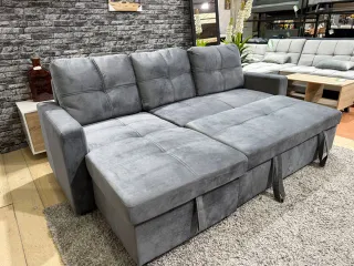 Sofá chaise longue gris con arcón