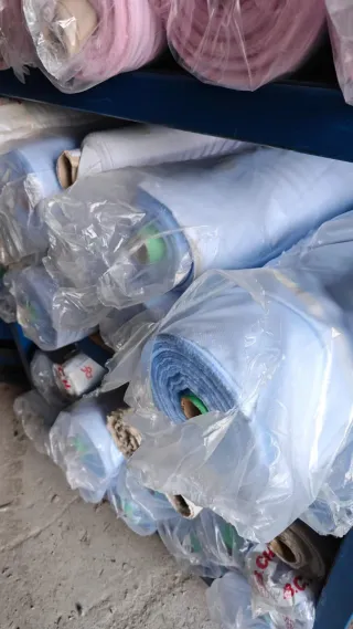 Lote 56.000 kg Tejidos para camisería y vestidos