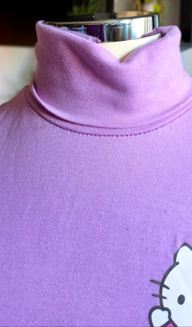 Jersey cuello vuelto Hello Kitty niña morado