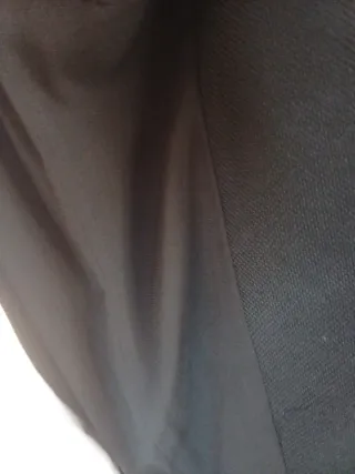 Americana negra con ribete