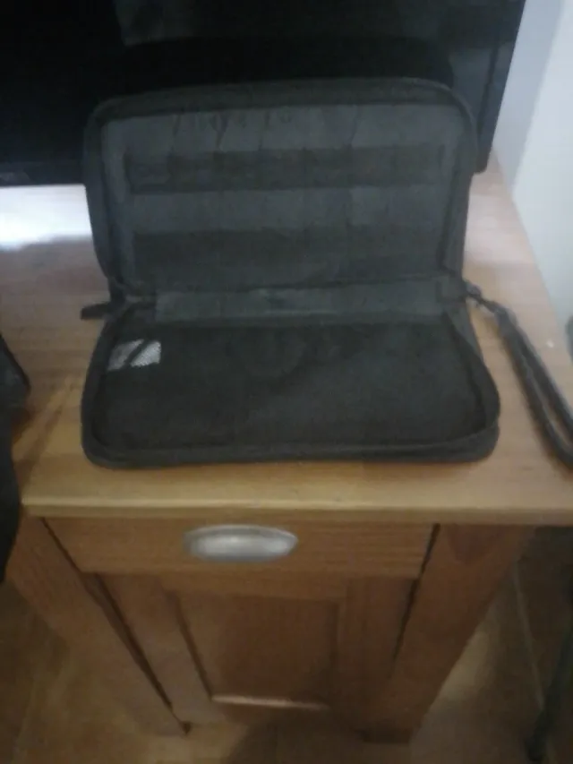 Funda para guardar nintendo suiwch y juego en ella