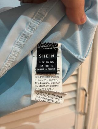 Top Camiseta Shein cuello V azul turquesa Talla M