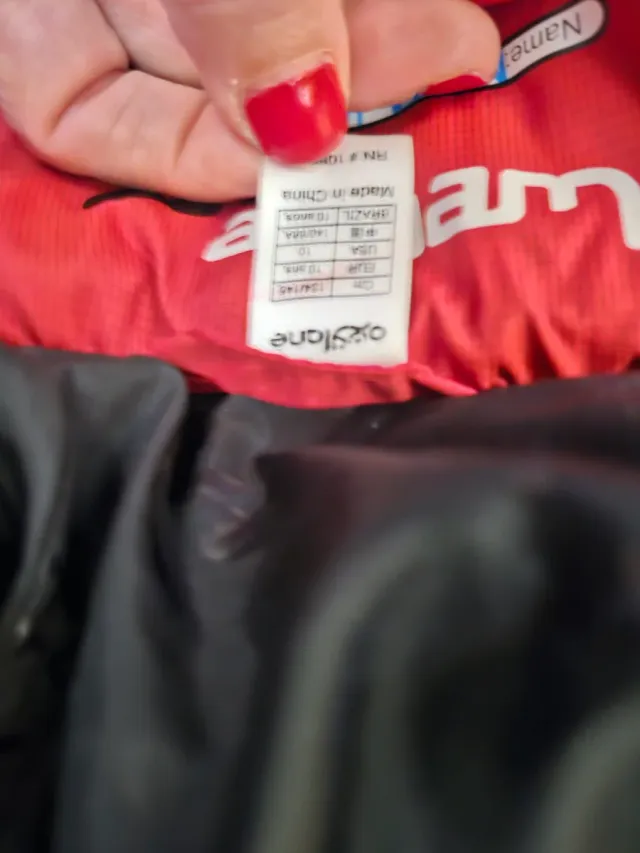 Plumas Wedze rojo niña