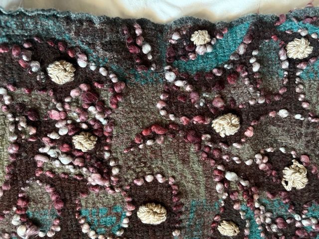 Bufanda tejida con flecos