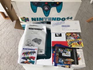Consola Nintendo 64 turquesa transparente con caja