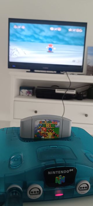 Consola Nintendo 64 turquesa transparente con caja