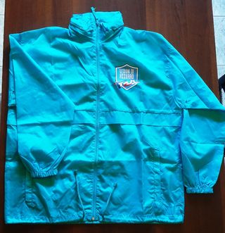 Impermeabile Lezioni di azzurro con logo taglia M