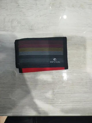 Cartera Rip Curl Negra y Roja Nueva