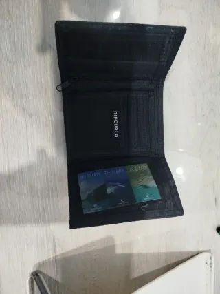 Cartera Rip Curl Negra y Roja Nueva