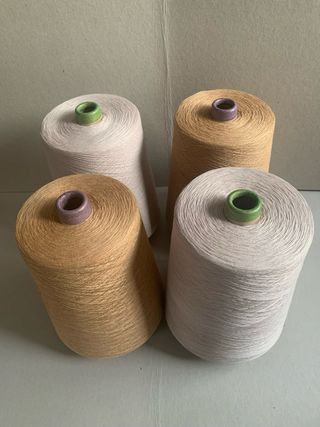 4 Conos Hilaturas E. Miroglio rosa y dorado