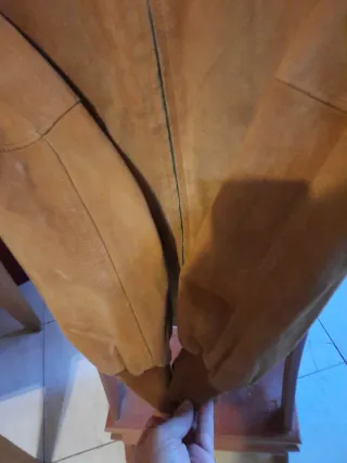 Chaqueta de cuero marrón usada