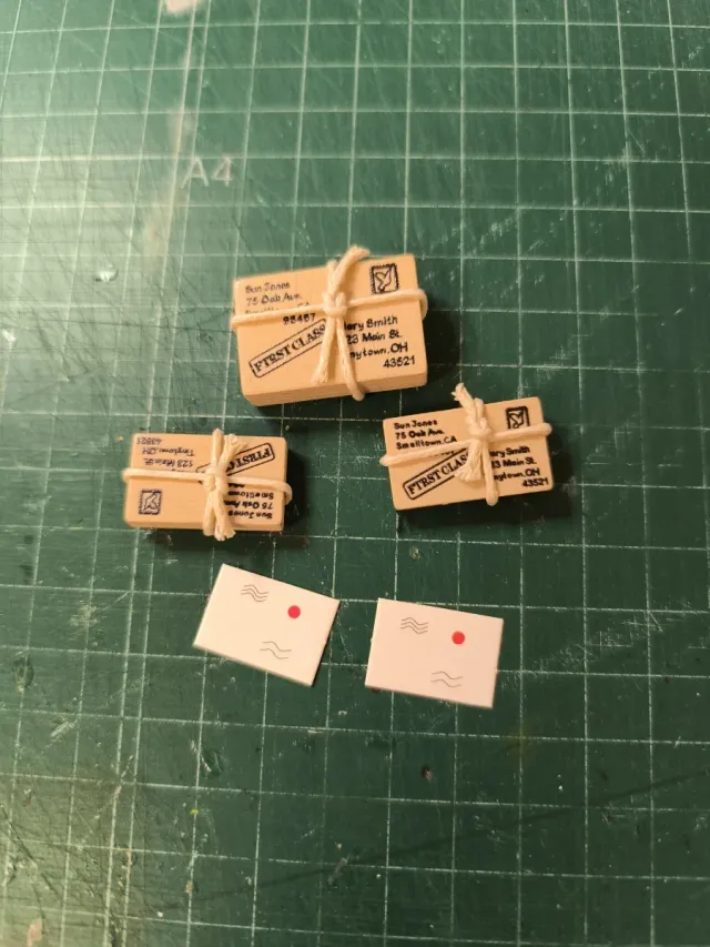 Miniaturas de casa de muñecas: sobres y paquetes