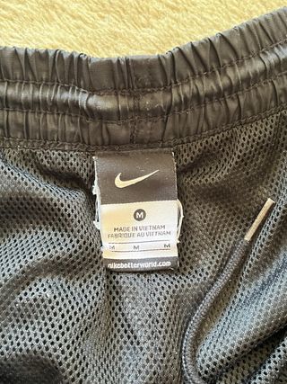 Pantalones Nike Vintage Negro con Raya Blanca