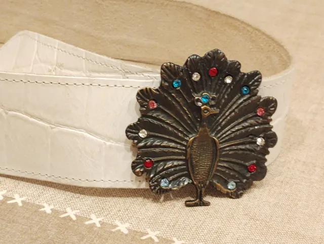 Cintura in vera pelle con fibbia pavone