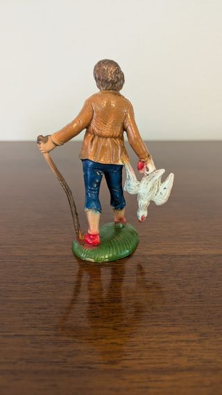 Statuina presepe: contadino con gallina