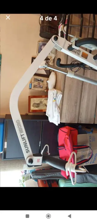 Grúa elevadora con arnés para discapacitados