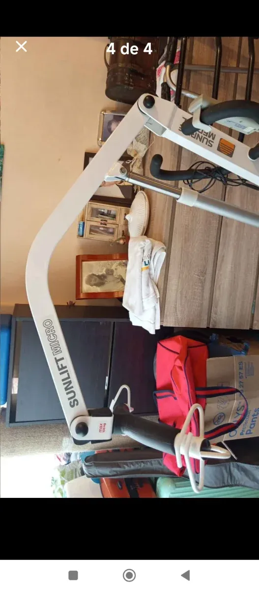 Grúa elevadora con arnés para discapacitados